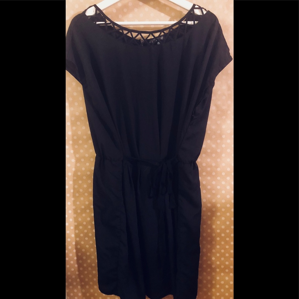 Black wide detailed neckline dress.